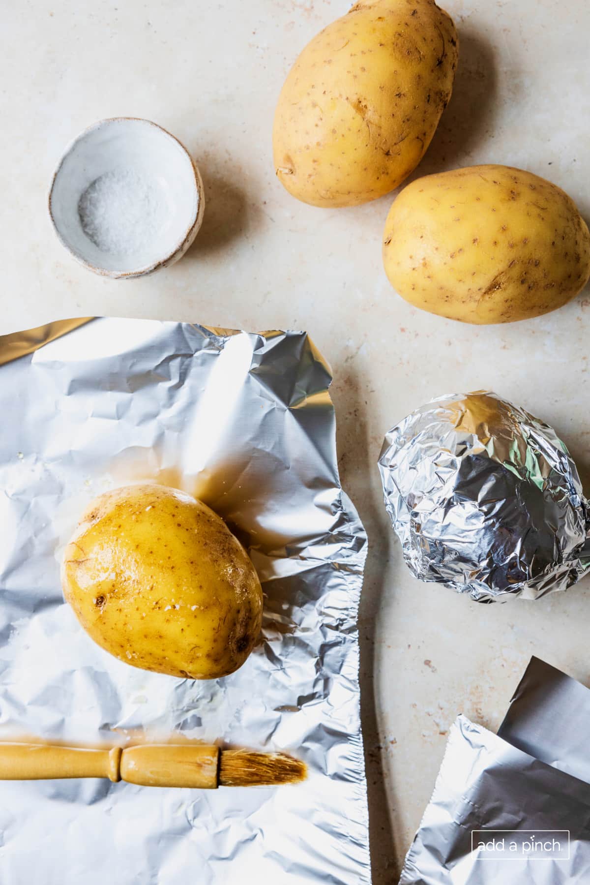 Photo of preparing potatoes for baking.