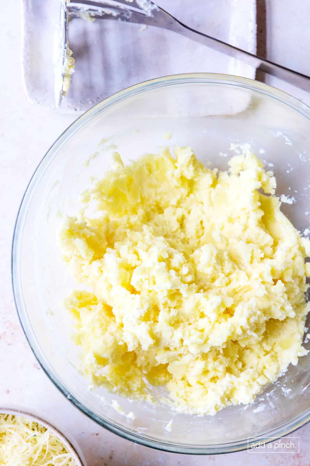 Potatoes have been mashed and include sour cream and butter. 