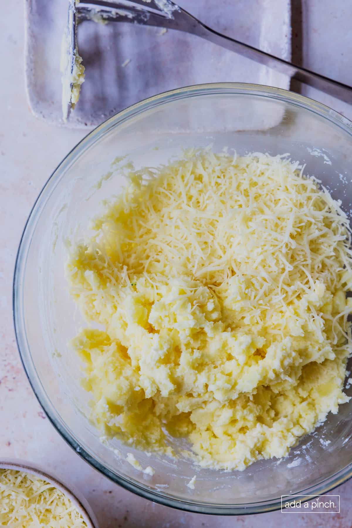 Filling for twice baked potatoes has cheese added.