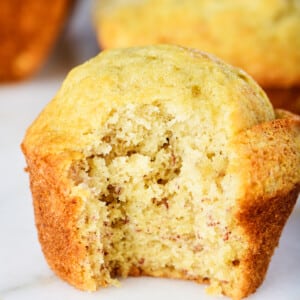 Photo of best banana bread muffin on a marble surface