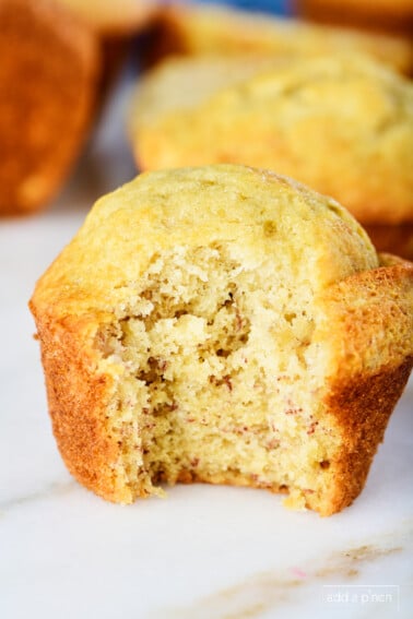 Photo of best banana bread muffin on a marble surface