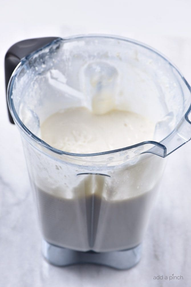 Plastic mixing jar full with ice cream mixture // addapinch.com