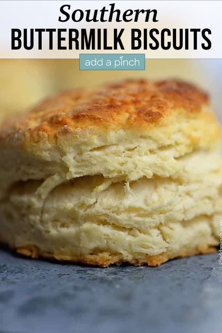 Golden Buttermilk Biscuit with layers - with text - addapinch.com
