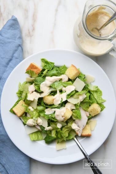 Caesar salad with Caesar dressing and croutons.