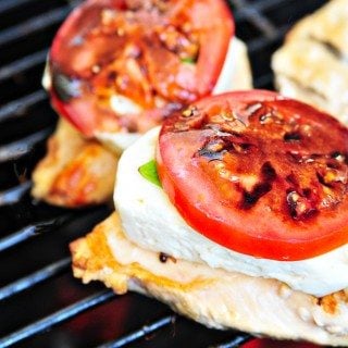 Caprese Grilled Chicken with Balsamic Reduction Recipe - A favorite caprese salad takes center stage with this delicious grilled chicken! // addapinch.com