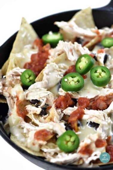 Chicken Nachos Recipe from addapinch.com