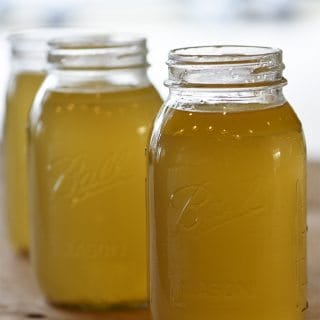 Homemade Chicken Stock Recipe - Learn how to make homemade chicken stock in just a few easy steps! // addapinch.com