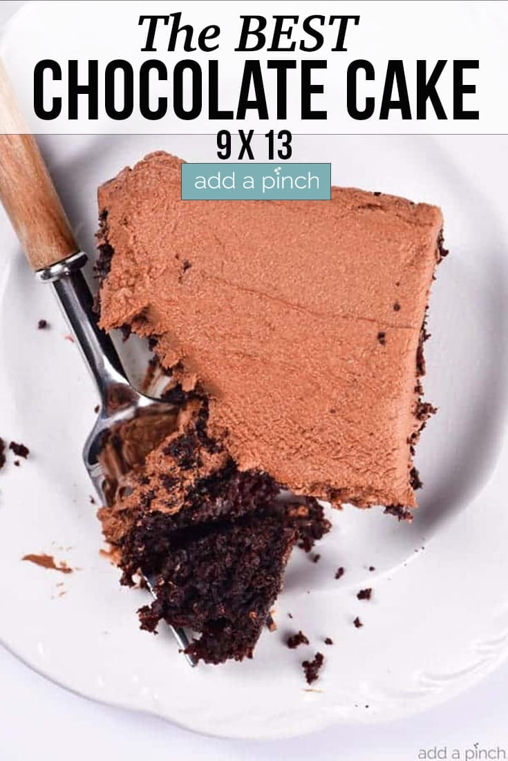 Square slice of Best Chocolate Cake 9x13 recipe with a fork on a white plate, with text from addapinch.com