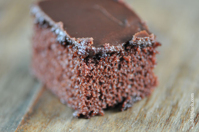 The Best Chocolate Cake with Fudge Icing | ©addapinch.com