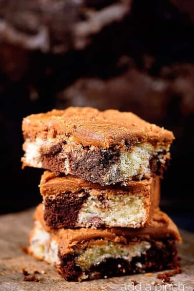 Chocolate Marble Squares makes a delicious cake recipe of marbled chocolate and white cake topped with homemade caramel icing! // addapinch.com