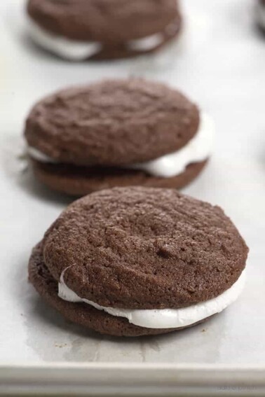 These Chocolate Marshmallow Sandwich Cookies make a delicious cookie recipe that chocolate lovers adore! So easy to make and fun to eat! // addapinch.com