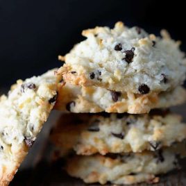 Coconut cookies make a for a favorite of holiday cookie recipes. These Coconut Dream Cookies are filled with mounds of coconut, chocolate, and use coconut oil. // addapinch.com