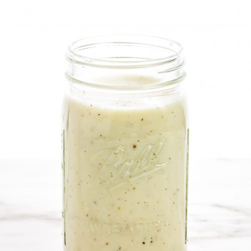 Condensed Cream of Chicken Soup - clear glass jar filled with homemade condensed cream of chicken soup. // addapinch.com