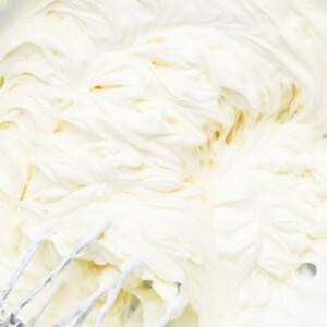 Fluffy cream cheese frosting after mixing with hand mixer.