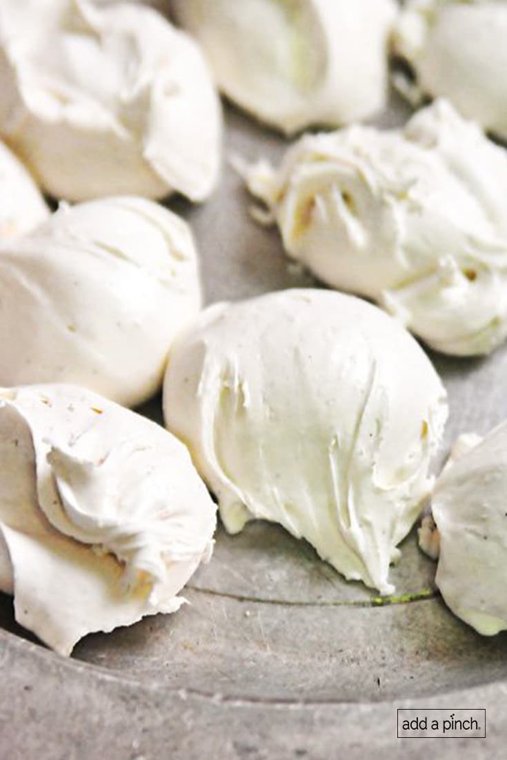 Photograph of white divinity candy on a silver plate.