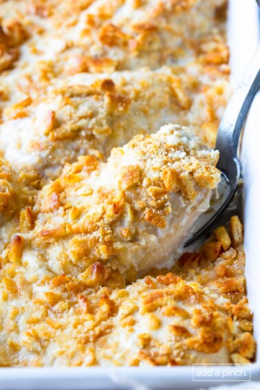 Photo of Ritz Chicken Casserole in a white baking dish.