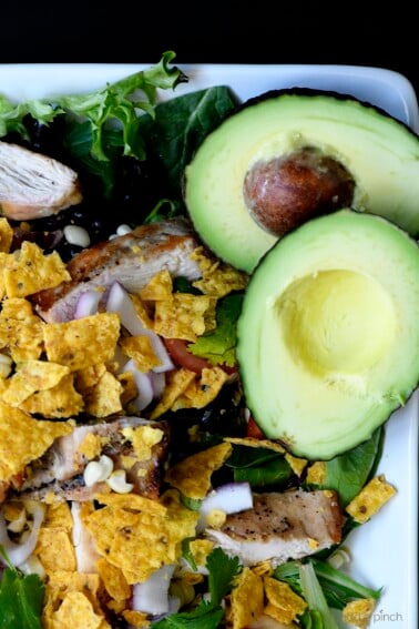 Grilled Chicken Fiesta Salad Recipe - This simple grilled chicken salad recipe is kicked up a notch for a spicy Tex-Mex favorite.