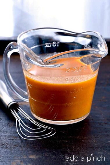 Homemade Buffalo Sauce Recipe - a quick and easy recipe for a delicious homemade version of classic buffalo sauce // addapinch.com