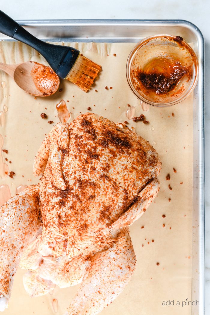 Learn how to make rotisserie chicken in your Instant Pot for tender, mouth-wateringly delicious rotisserie-style chicken every time! // addapinch.com