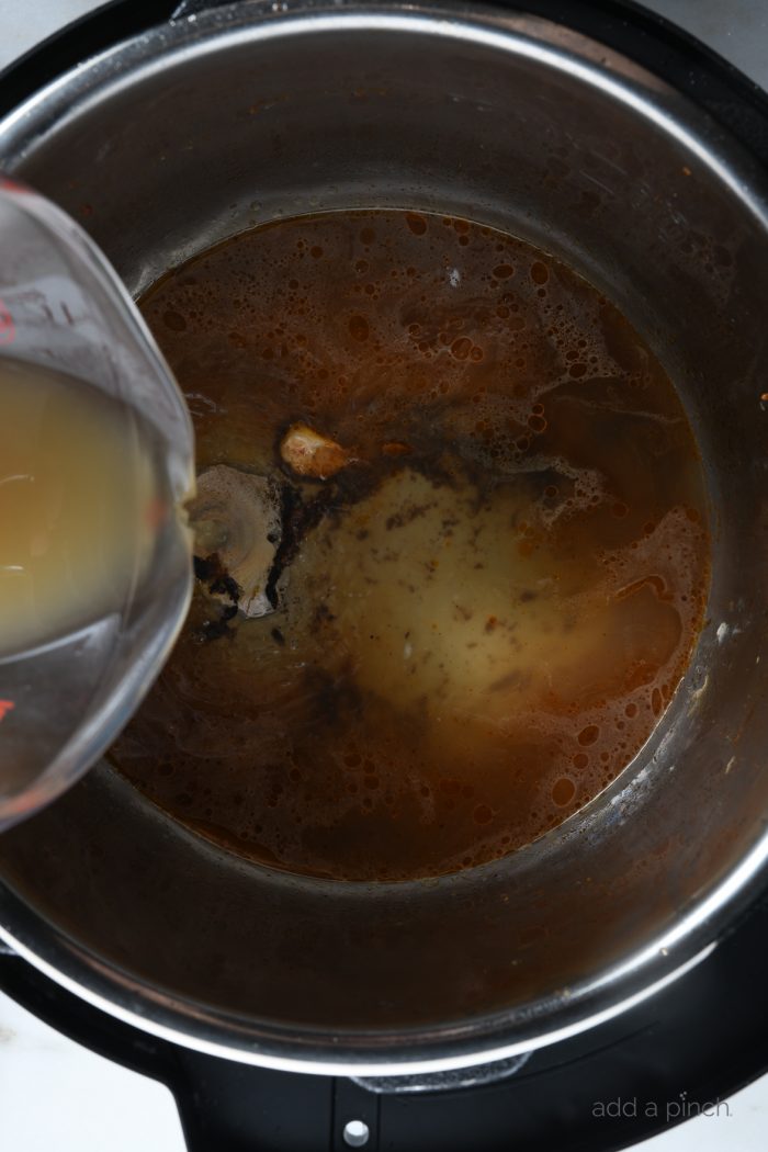 Learn how to make rotisserie chicken in your Instant Pot for tender, mouth-wateringly delicious rotisserie-style chicken every time! // addapinch.com