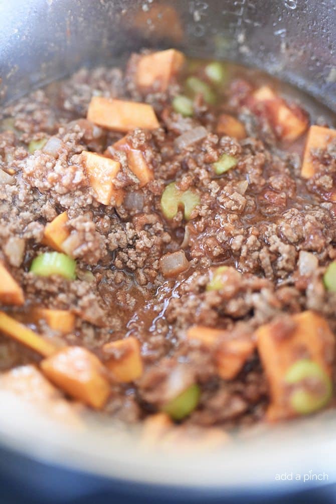 Instant Pot Sweet Potato Chili Recipe - This Instant Pot Sweet Potato Chili makes a hearty, delicious chili recipe in minutes! Made with ground beef, sweet potatoes, and packed with flavor! // addapinch.com