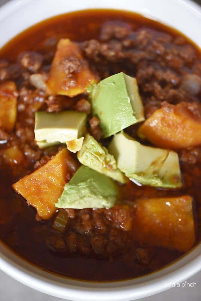 Instant Pot Sweet Potato Chili Recipe - This Instant Pot Sweet Potato Chili makes a hearty, delicious chili recipe in minutes! Made with ground beef, sweet potatoes, and packed with flavor! // addapinch.com