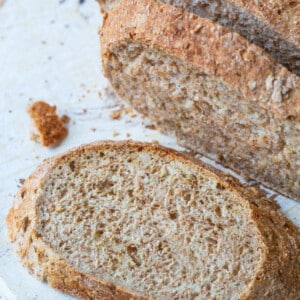 Sliced Irish Soda Bread on a white plate.