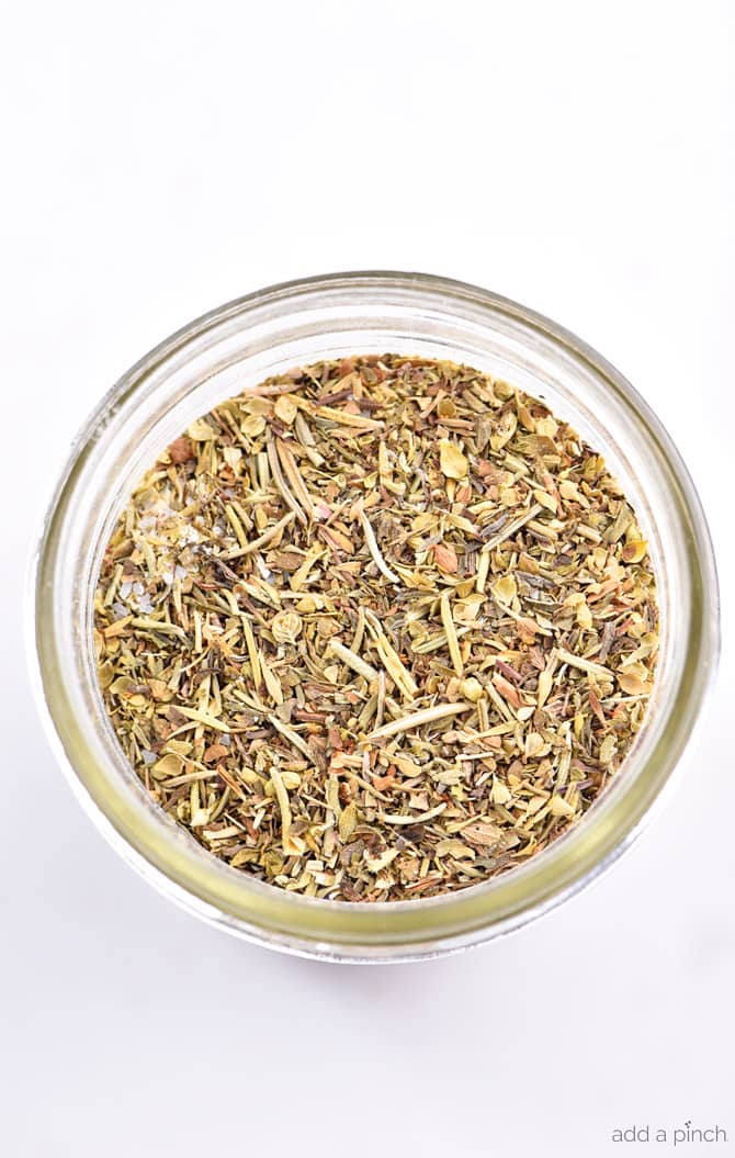 Italian Seasoning Mix all blended together in a glass jar.