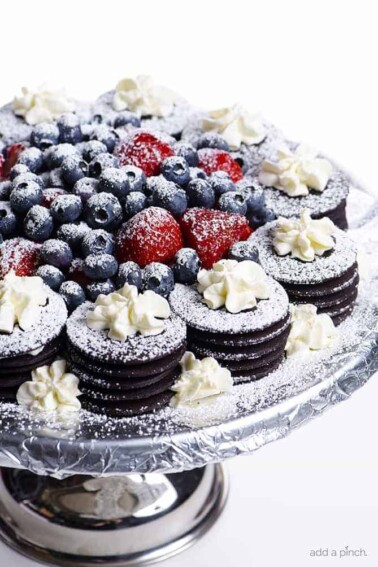 No Bake Chocolate Wafer Cheesecake Recipe - This easy no-bake dessert recipe comes together quickly for a beautiful, yet simple dessert! // addapinch.com