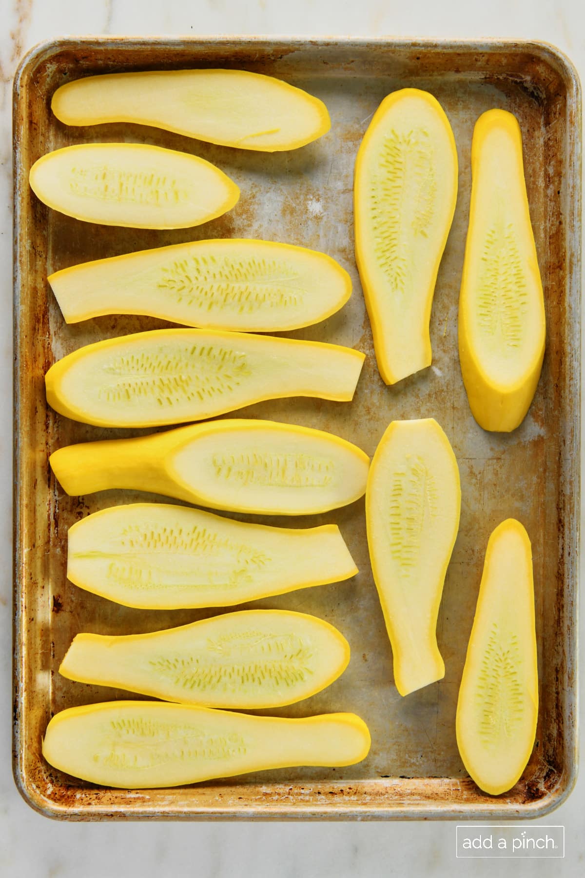 Squash on a baking sheet.