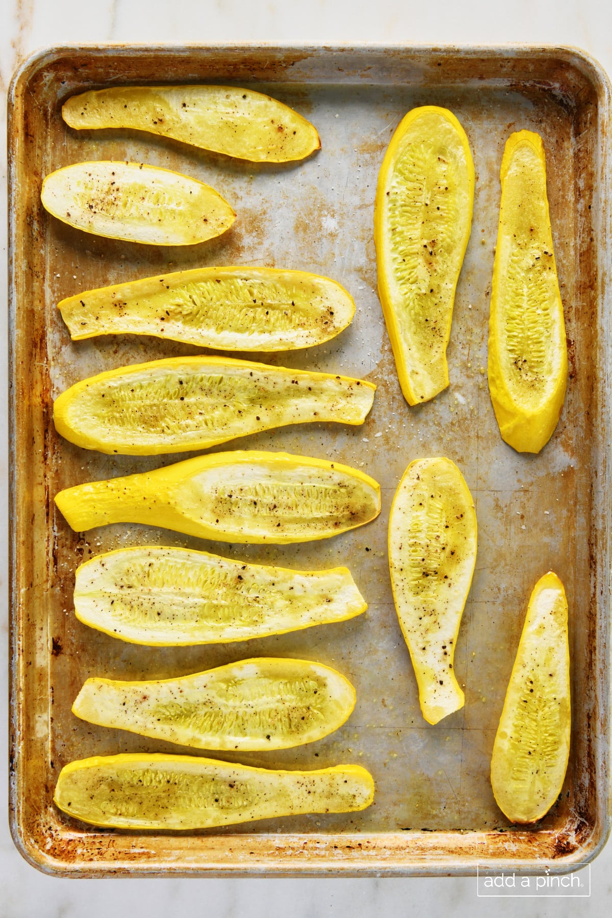 Easy roasted squash on a baking sheet.