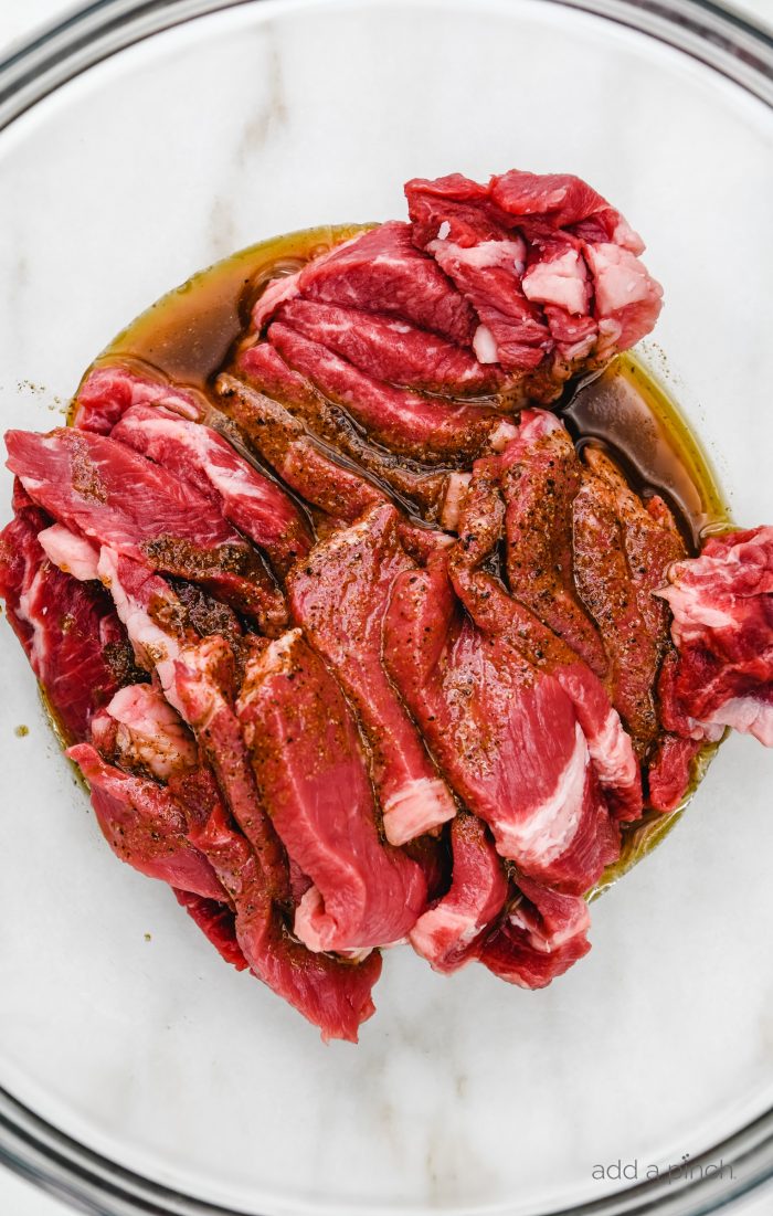 Rib Eye Fajitas Recipe - Ribeye Steak Fajitas are so quick, easy and flavorful! Made with perfectly seasoned, tender Ribeye steak, bell peppers and onions, they are always a favorite! // addapinch.com