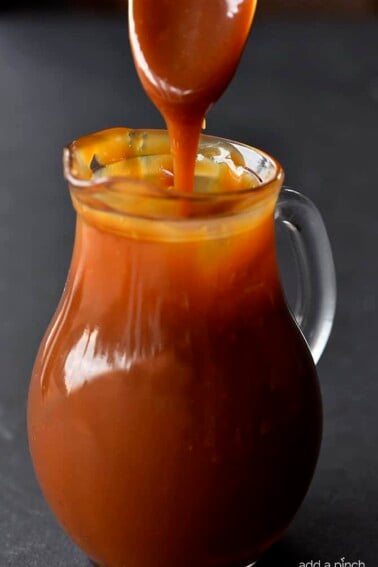 Salted Caramel Sauce Recipe - The absolute best salted caramel sauce recipe that I have ever tasted! Smooth, creamy and perfect every single time! // addapinch.com