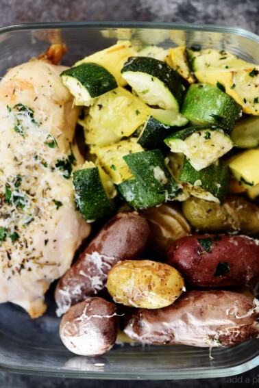 Sheet Pan Parmesan Chicken and Vegetables Recipe - This super easy, 30 minute meal makes a simple, yet scrumptious supper of juicy chicken and vegetables topped with Parmesan! // addapinch.com