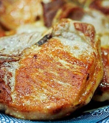 Skillet pork chops recipe - ready in less than 30 minutes. Makes a perfect busy weeknight meal.