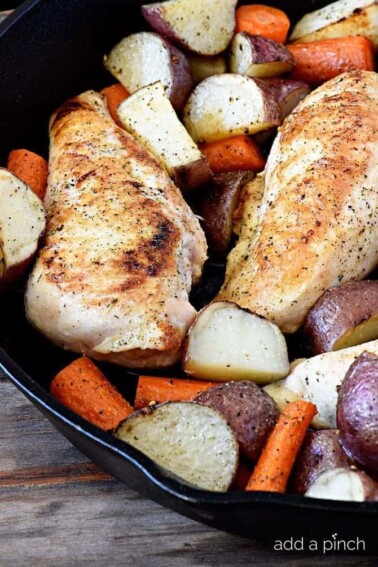This skillet ranch chicken recipe makes a quick and easy weeknight supper. Full of flavor, this one-skillet meal combines chicken, potatoes, carrots, and my homemade ranch seasoning for a mighty delicious meal! // addapinch.com