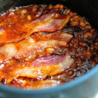 Southern Baked Beans Recipe - This recipe makes the perfect side dish for so many meals! This easy baked beans recipe will become a favorite! // addapinch.com