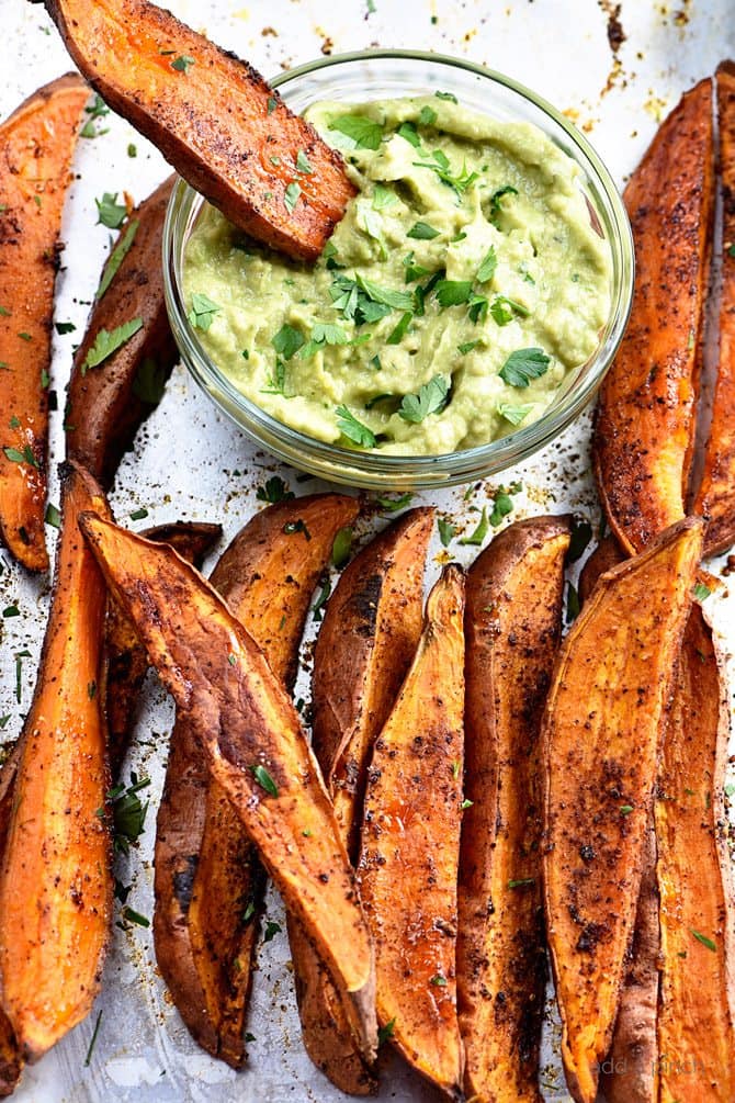 Spicy Sweet Potato Wedges Recipe - Spicy Roasted Sweet Potato Wedges make an easy and delicious recipe! Made with just five ingredients, these roasted sweet potatoes will definitely become a favorite! // addapinch.com