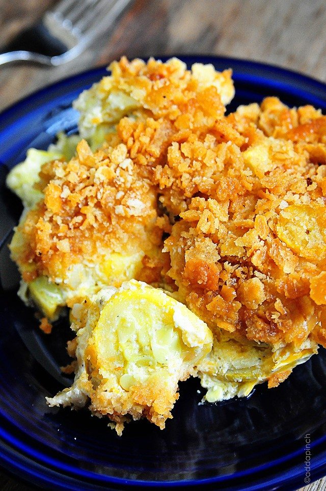 Photo of squash casserole on blue plate.