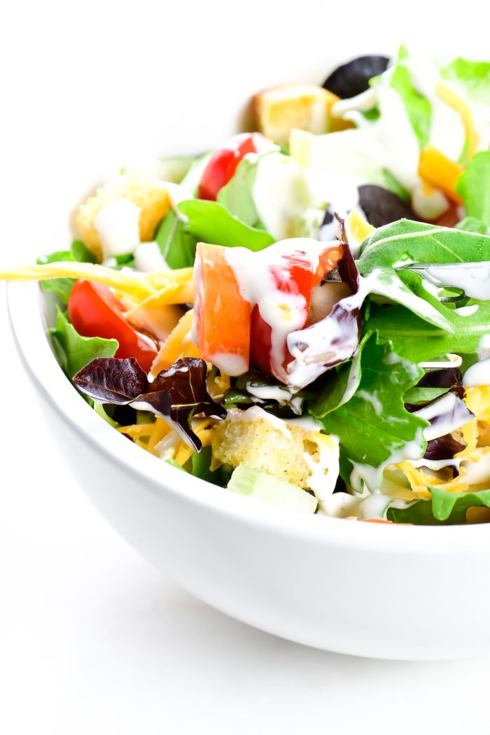 This simple salad recipe makes the best house salad that goes with anything! Made with simple greens and add-ins, this is the side salad of all side salad recipes! // addapinch.com