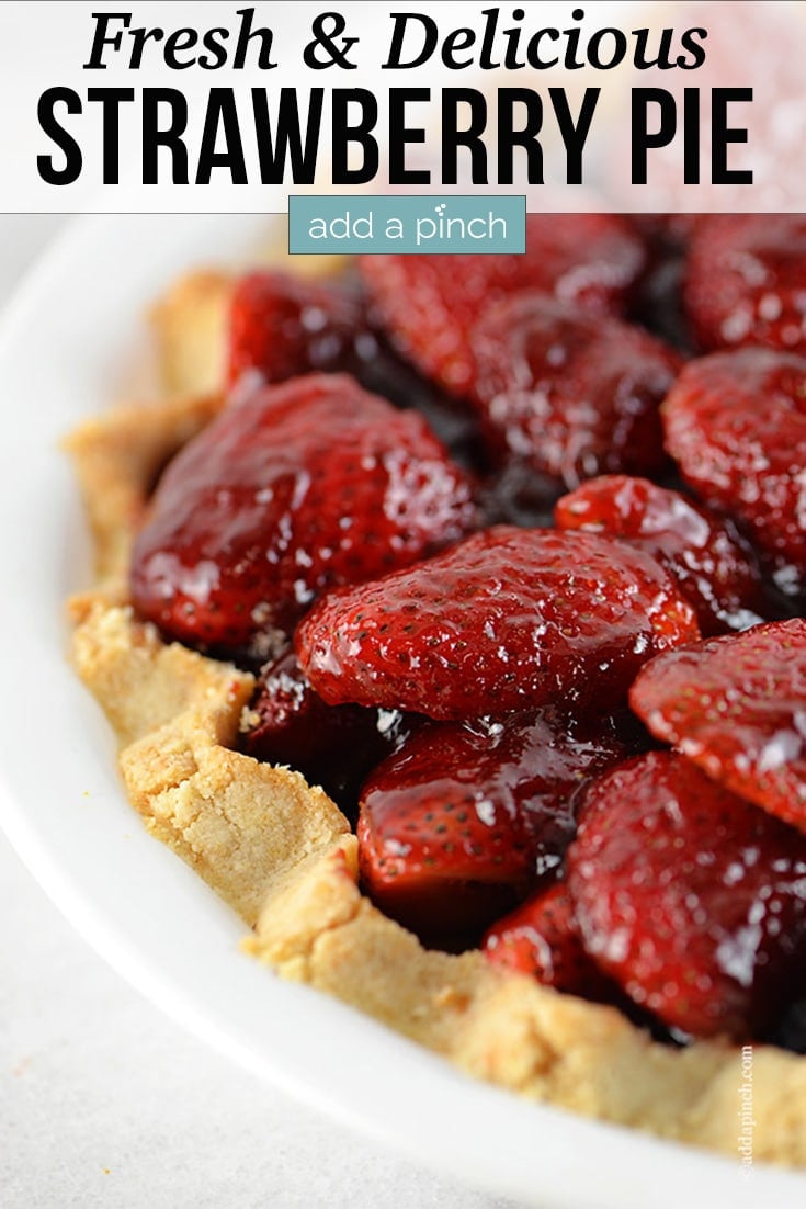 Strawberry Pie with Shortbread Crust in white pie plate - with text - addapinch.com