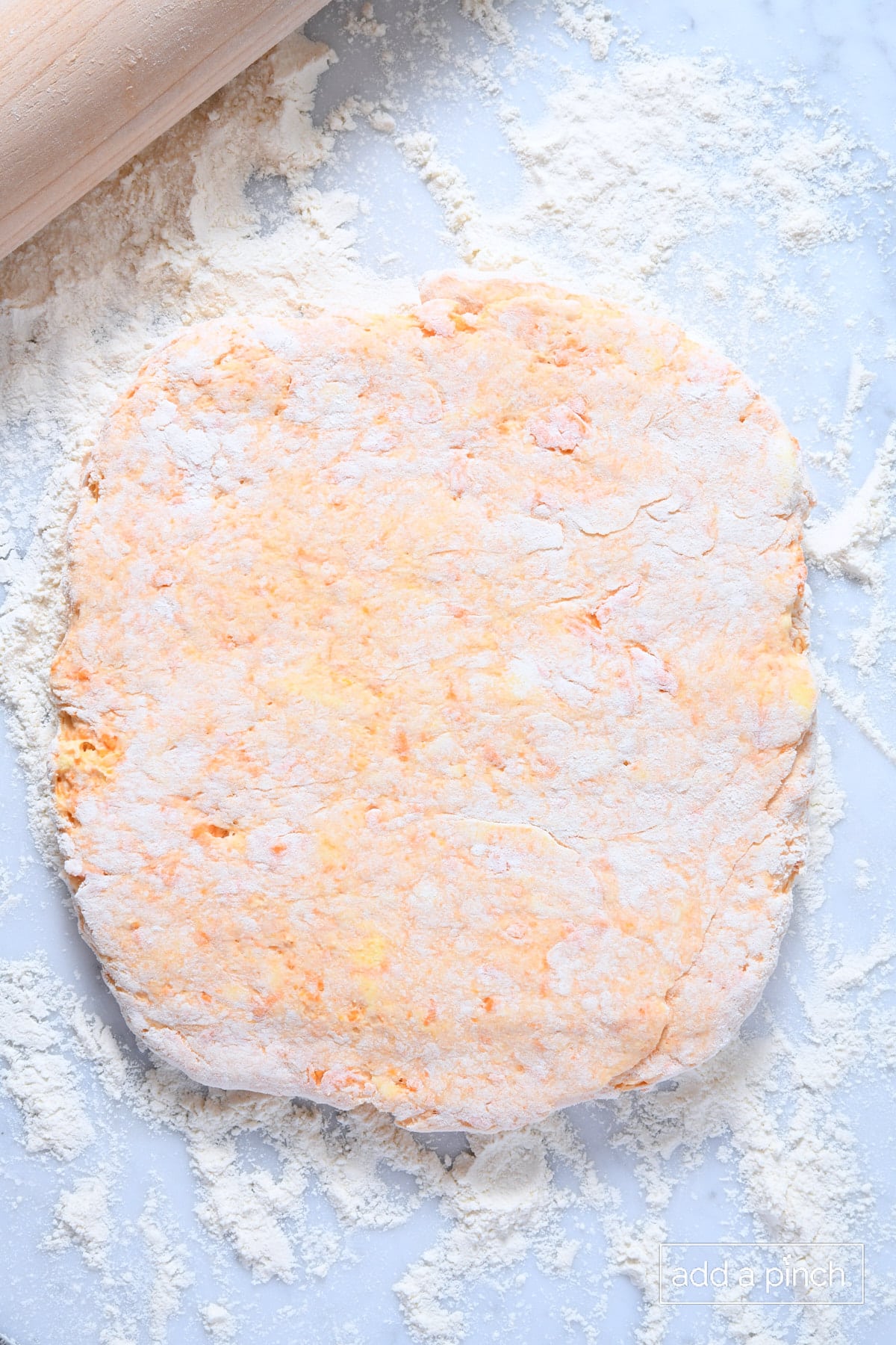 Rolled dough ready for cutting.