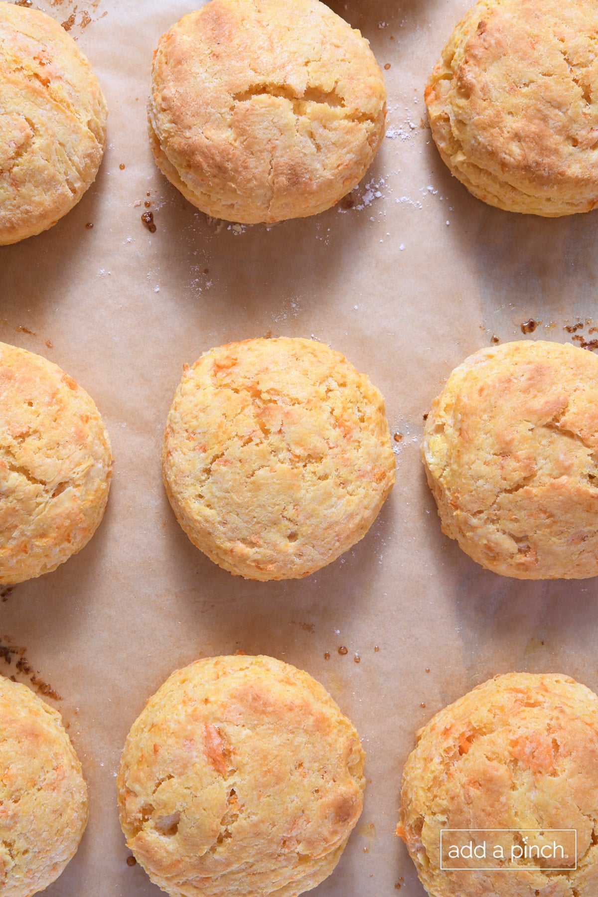 Baked biscuits on a baking sheet.
