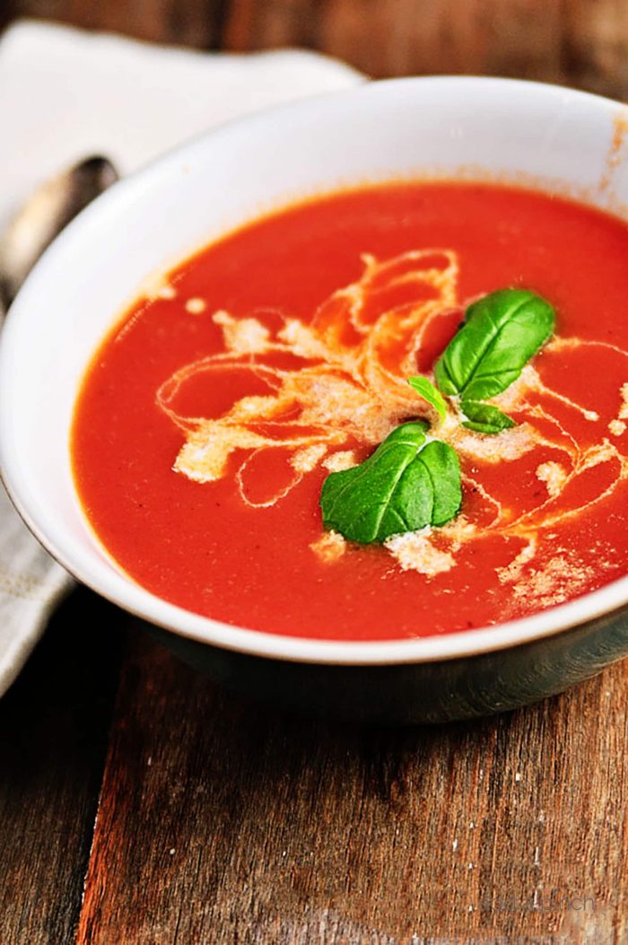 Tomato Soup Recipe - This fresh, homemade tomato soup comes together quickly for a delicious, comforting classic. Ready in 15 minutes!ย // addapinch.com