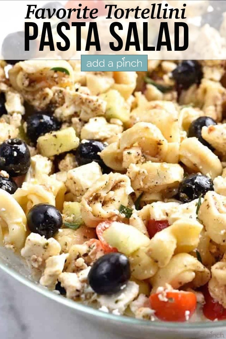 Tortellini Pasta Salad in bowl - with text - addapinch.com
