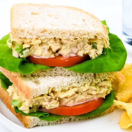 This tuna salad sandwich is so quick and easy and makes for a simple, yet scrumptious meal! Made with tuna, mayonnaise, and a few ingredients that make this the best tuna salad sandwich I've ever tasted! // addapinch.com