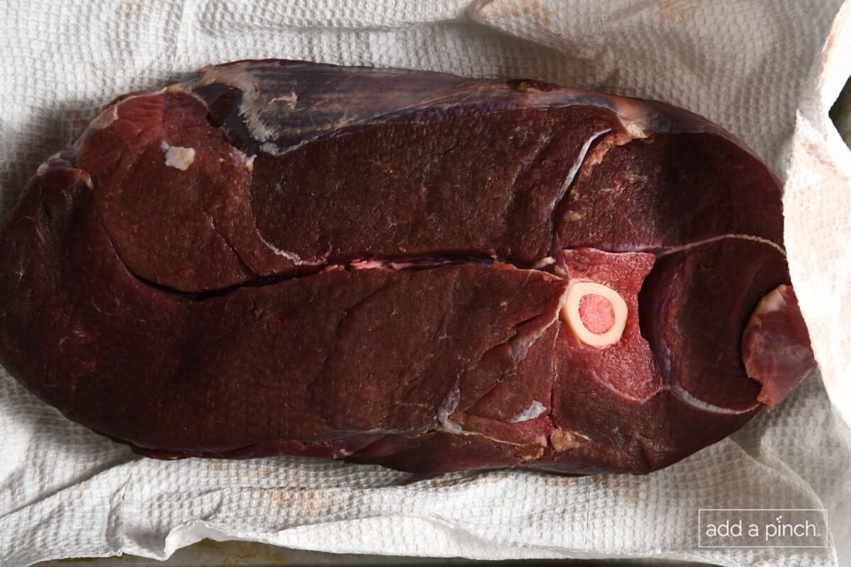 Deer roast dry aging on paper towels.