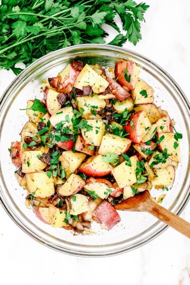 Warm Potato Salad with Bacon and Onion Recipe - A simple, savory potato salad perfect for summer parties, camping, potlucks and picnics! // addapinch.com
